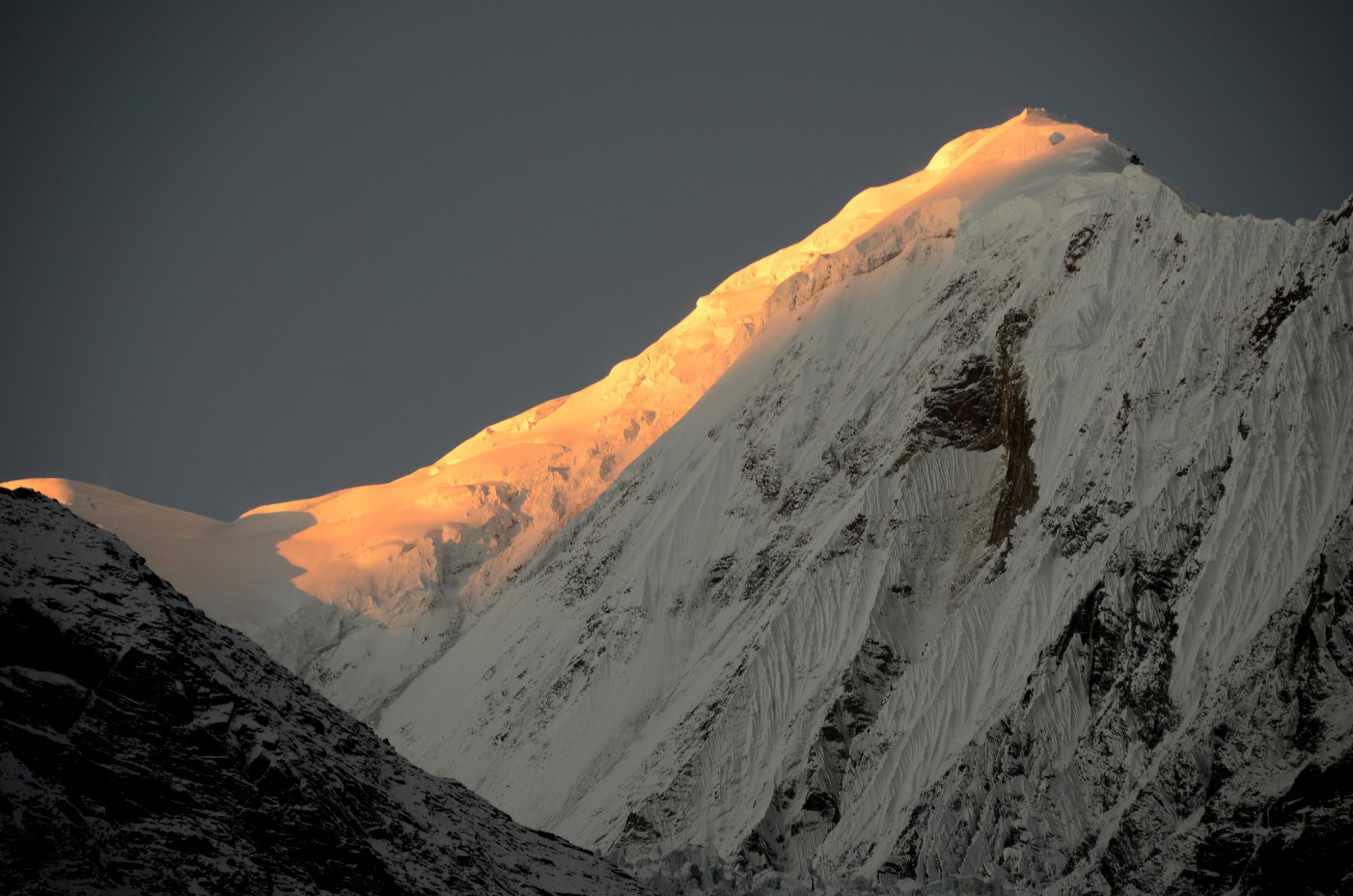 05 First Rays Of Sunrise Strike Gangapurna Close Up From Manang 